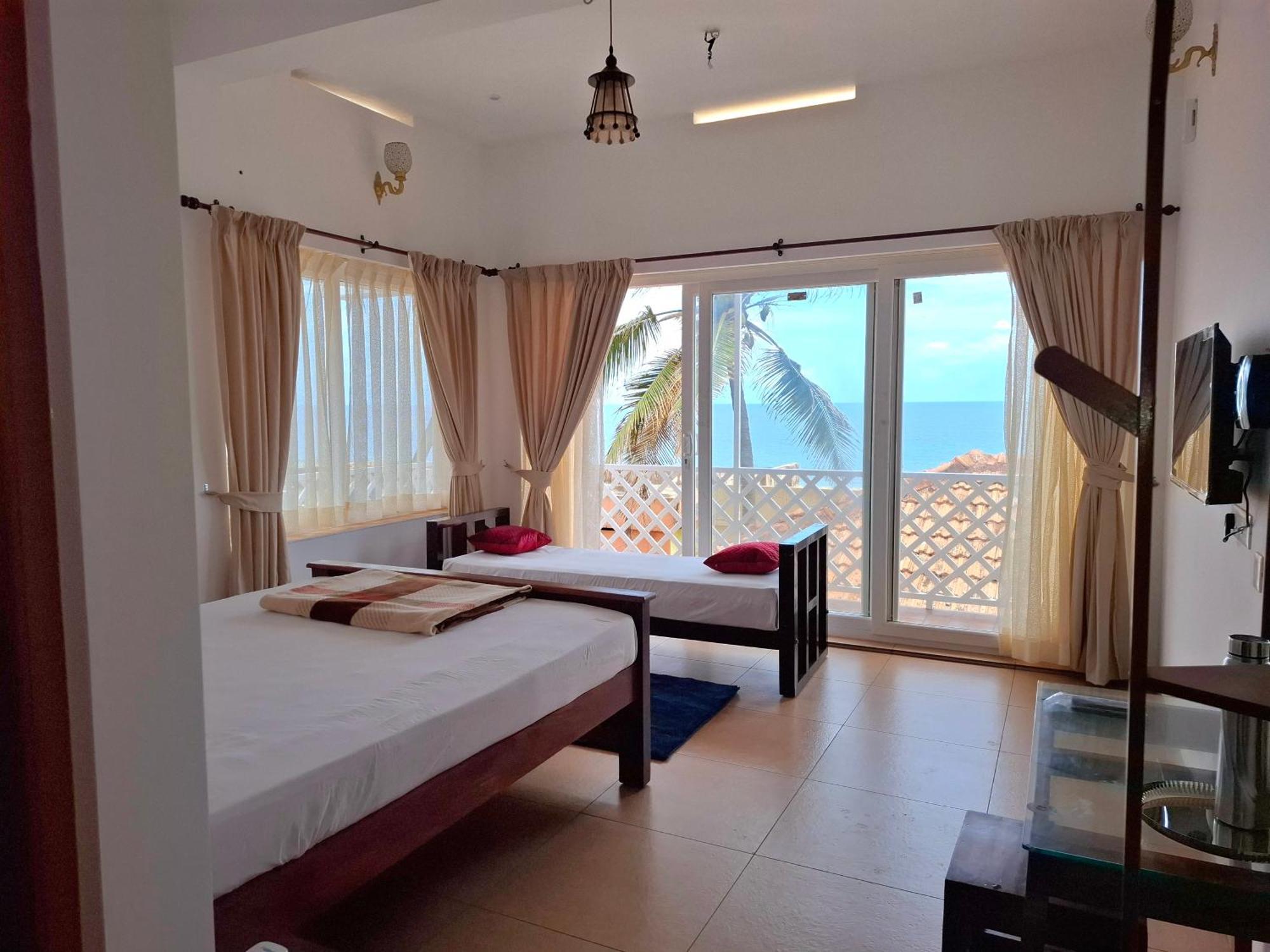 טריואנדרום Seaside Homestay מראה חיצוני תמונה